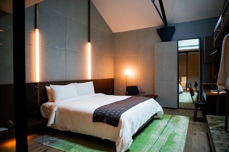Hotel guest room with warm accent lighting